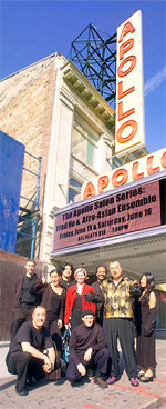 Photo of Fred Ho & his Afro-Asian Ensemble in front of the Apollo.